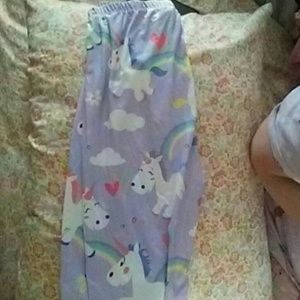 Never been worn size 12 unicorn/rainbow leggings.